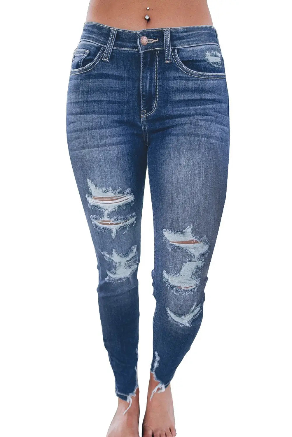 Medium Wash High Rise Distressed Skinny Jeans with ripped knees and frayed hems