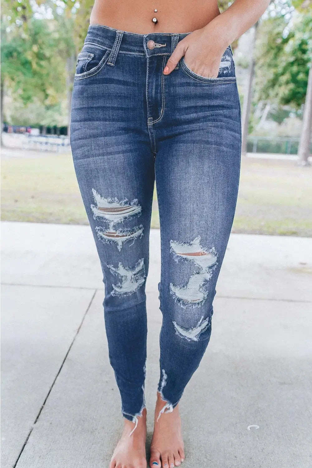 Dark wash distressed skinny jeans with raw hem from Medium Wash High Rise Distressed Skinny Jeans
