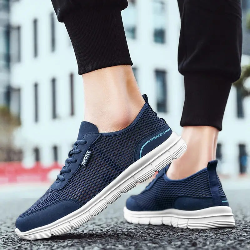 Pair of dark blue breathable mesh shoes with white soles for Men’s Breathable Mesh Shoes