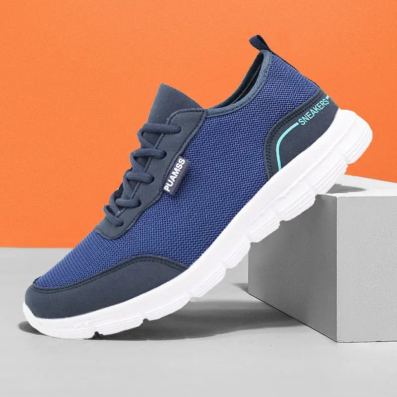 Men’s breathable mesh shoes in dark blue with white soles and light blue accents