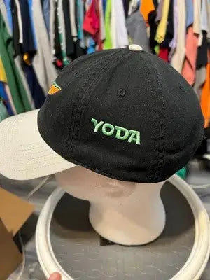 Star Wars baseball hat with green Yoda embroidery and white brim for master builder fans