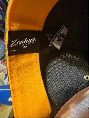 Interior view of a men’s black and orange Tennessee Vols baseball cap