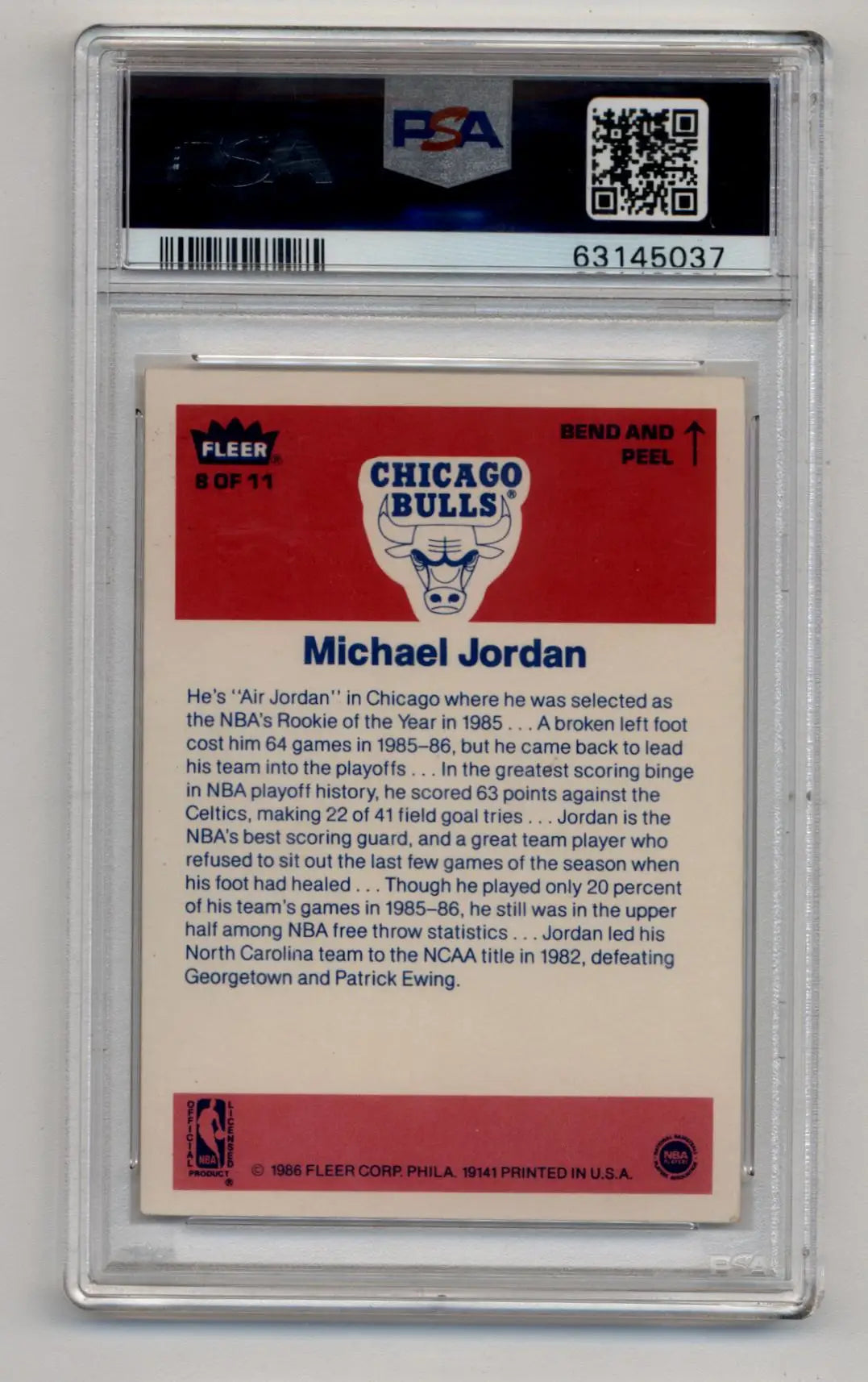 PSA-graded red and white Chicago Bulls Michael Jordan Fleer Sticker trading card in case