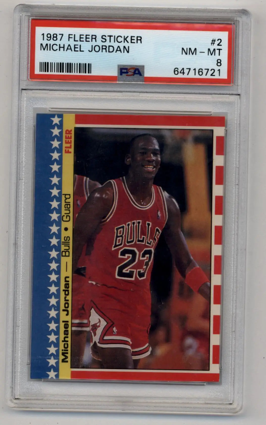 PSA-graded 1987 Fleer Sticker of Michael Jordan in red #23 jersey trading card