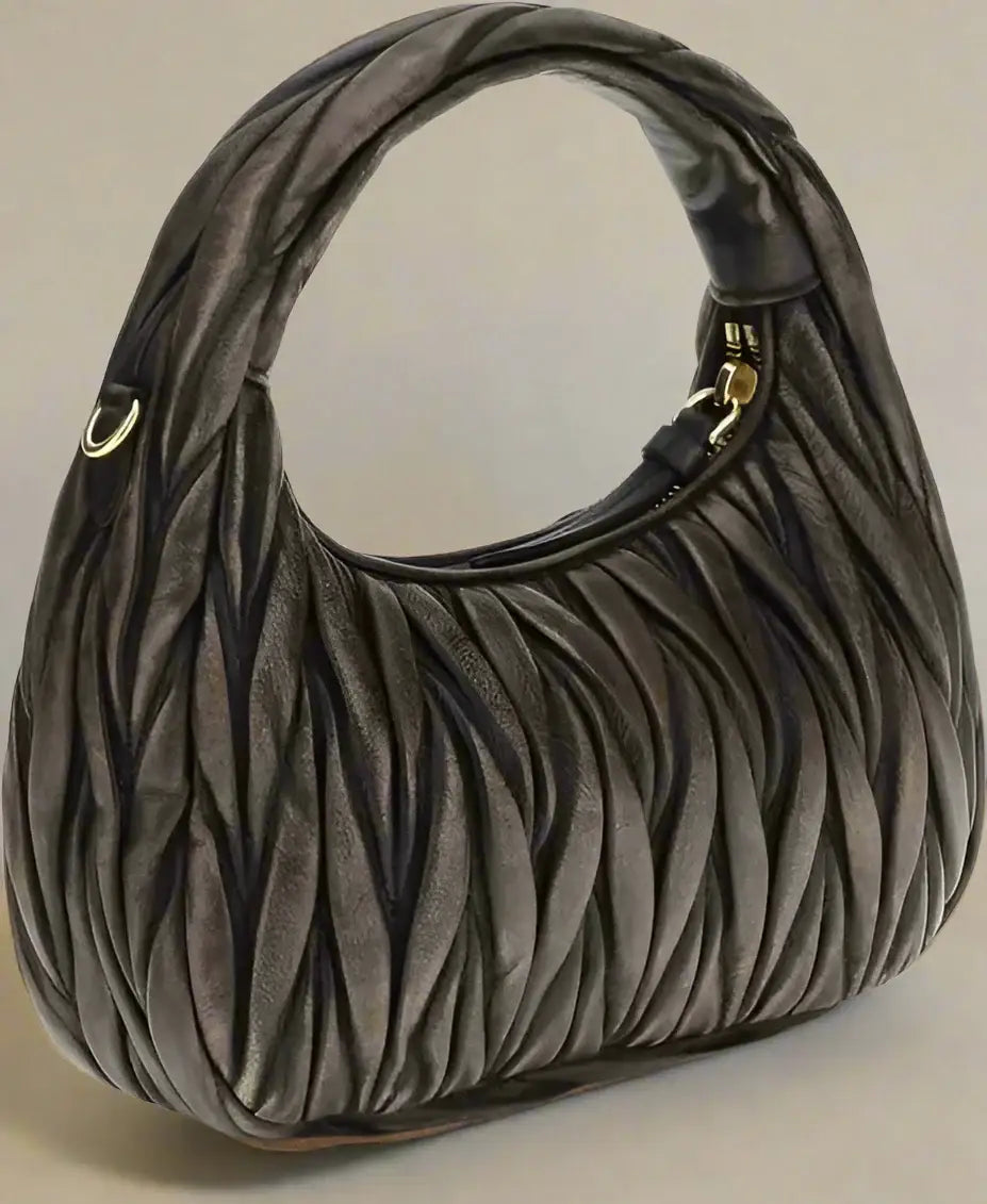 Gray quilted leather Miu Miu Wander shoulder bag with gold hardware and top zipper closure