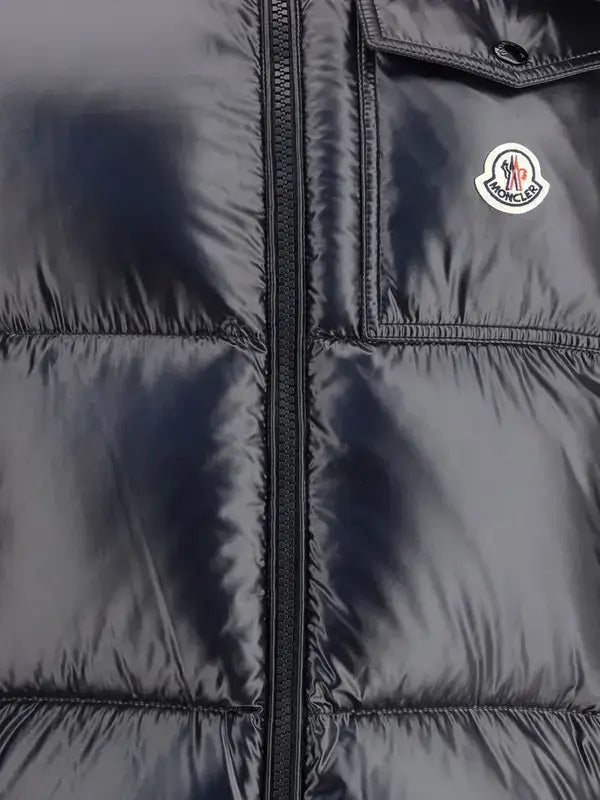 Glossy black puffer vest with zipper, chest pocket, logo patch, part of MONCLER Midnight Blue Montbeliard collection
