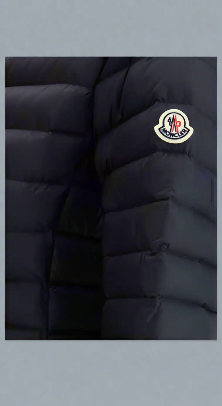 Dark blue Moncler Womens IGELONG Down Jacket with iconic logo patch on left sleeve