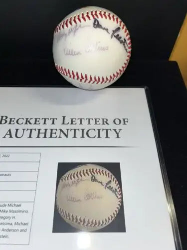 Autographed NASA baseball featuring 8 astronauts with authentication document for collectors