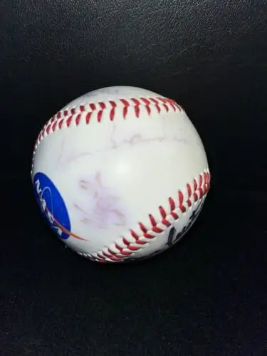 NASA baseball with red stitching featuring autographs of 8 astronauts for collectors