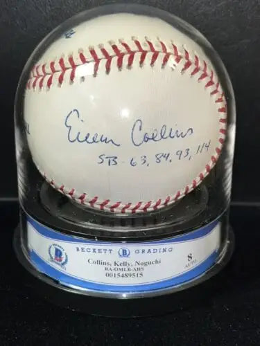Autographed Eileen Collins and Soichi Noguchi astronaut baseball in a display case