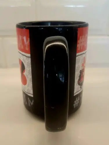 Black mug with handle for Cincinnati Bengals fans, perfect for game day, officially licensed