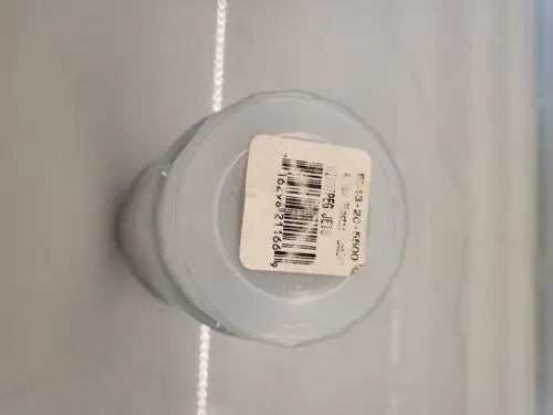White tape roll with label beside NEW NHL Toronto Maple Leafs Plastic Logo’d Cups