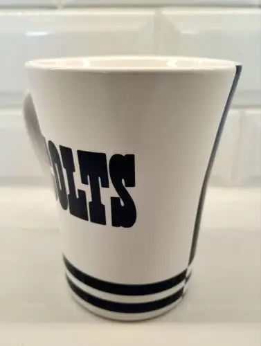 White mug with black stripes from Boelter Brands featuring Baltimore Colts logo