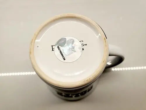 Bottom of Baltimore Colts coffee mug with sticker from Boelter Brands