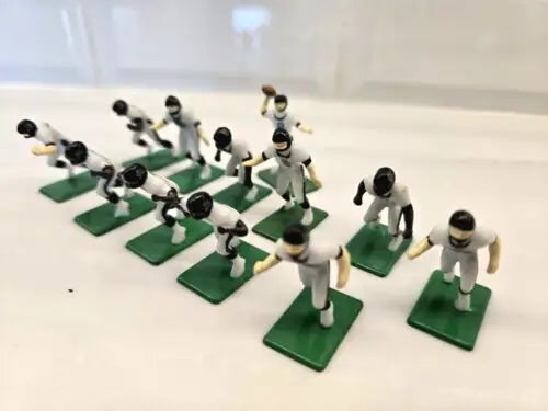 Miniature Jacksonville Jaguars electronic football players with QB and ball for electronic football