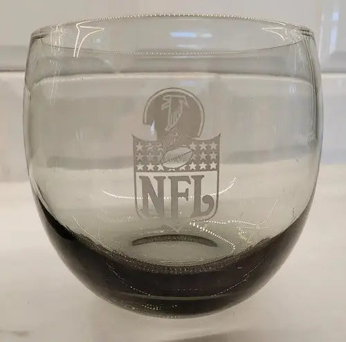 Clear glass bowl with NFL logo from vintage Atlanta Falcons smokey Rolly Polly set