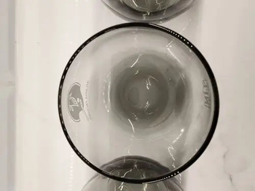 Smoked glass bowl with black rim from vintage Atlanta Falcons smokey Rolly Polly set