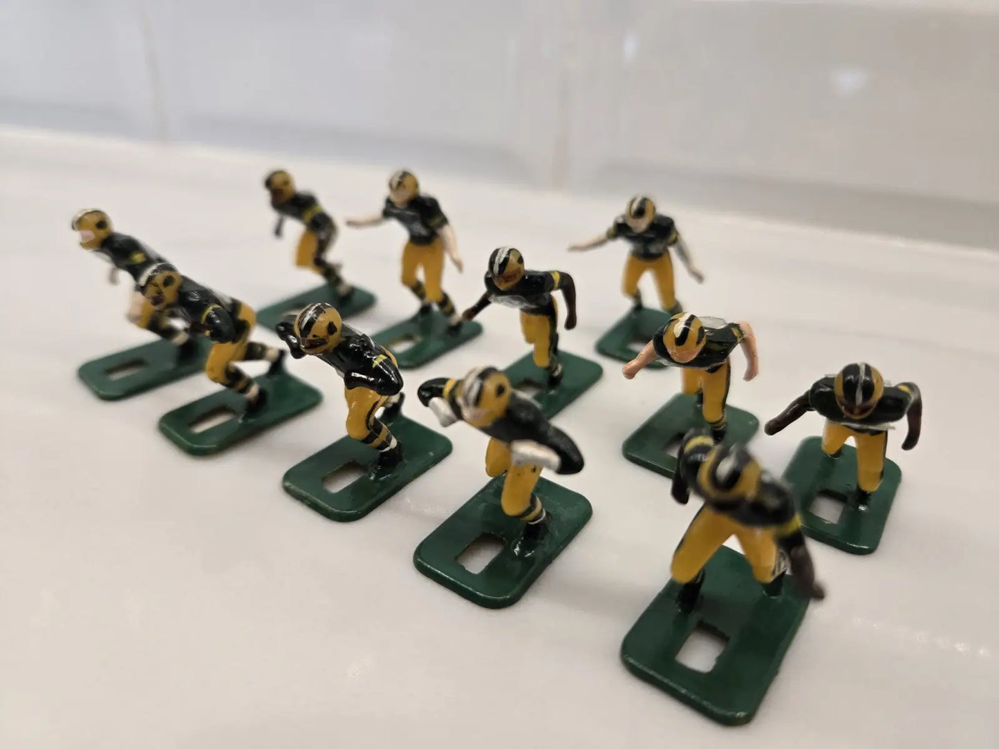 Miniature football player figurines of Green Bay Packers for NFL Vintage Tudor collection
