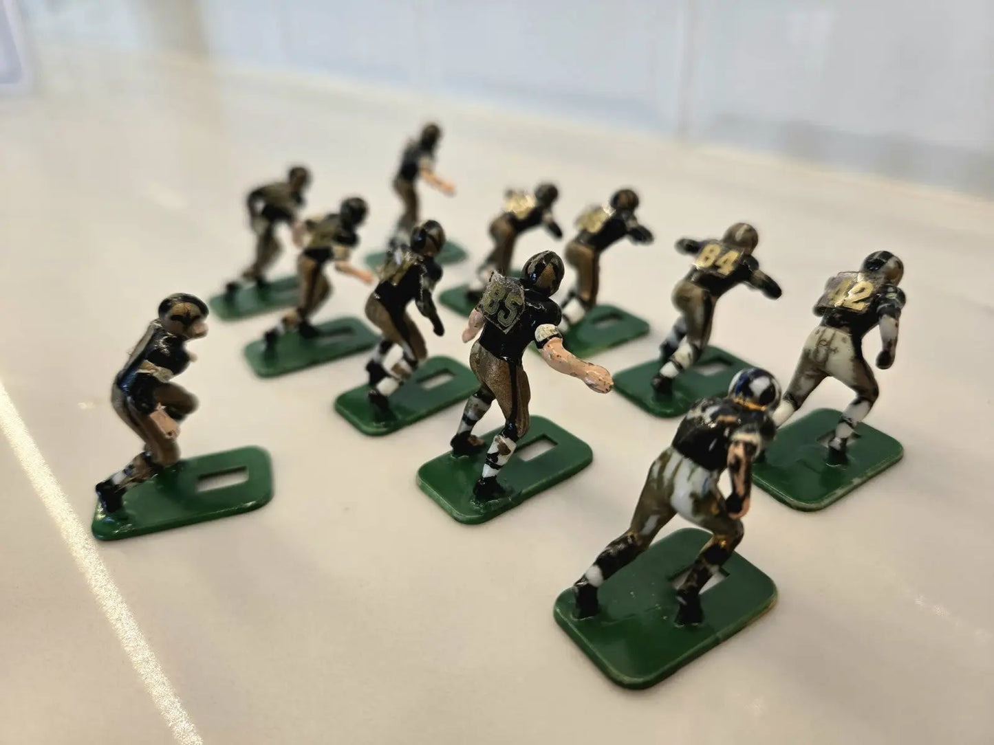 Miniature football player figurines from the Orleans Saints Electronic set