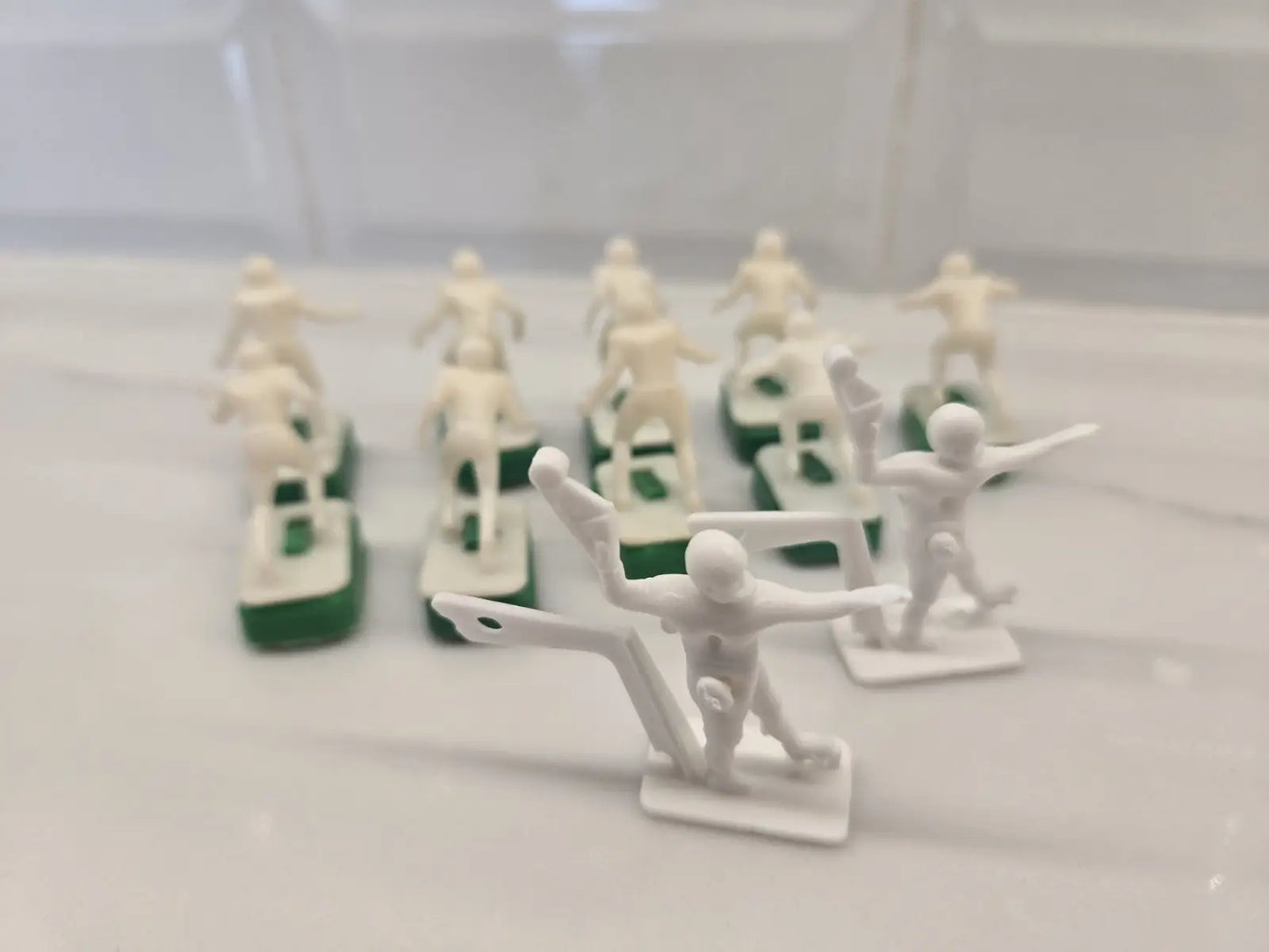 Toy plastic army men displayed with NFL Vtg 1970s Tudor Unpainted Electronic Football Set