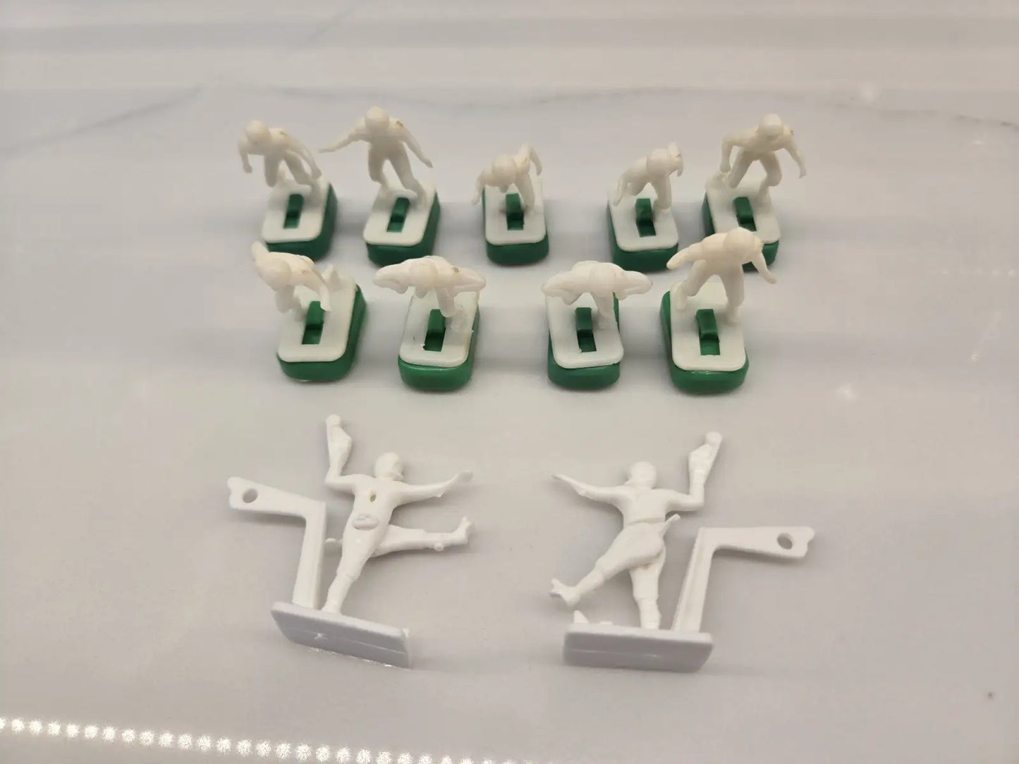 White plastic toy soldiers from NFL Vtg 1970s Tudor electronic football set