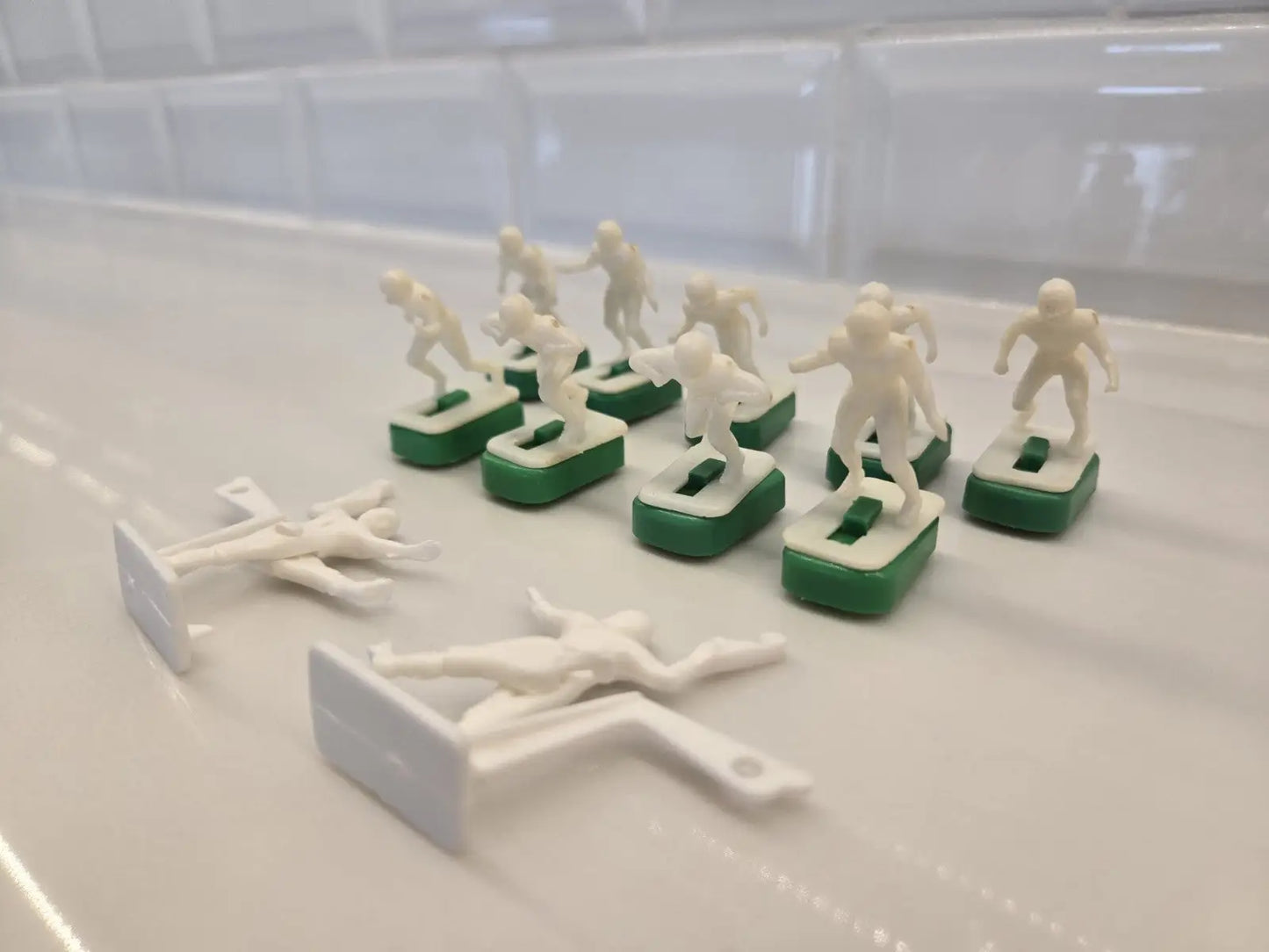 Miniature football figures from NFL Vintage 1970s Tudor electronic football set