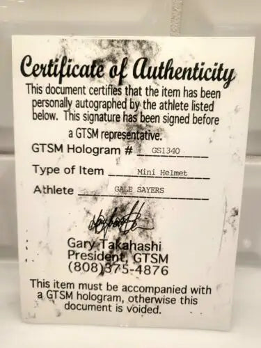 Certificate of authenticity for a Gale Sayers Chicago Bears mini-helmet