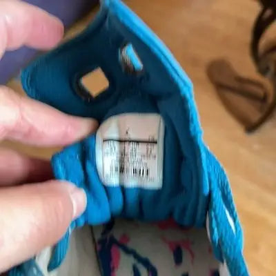 Blue Nike Air Jordan High Top Sneakers with size tag for youth girls