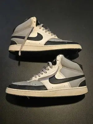 Worn Nike Court Vision Mid Black White high-top sneakers in good condition