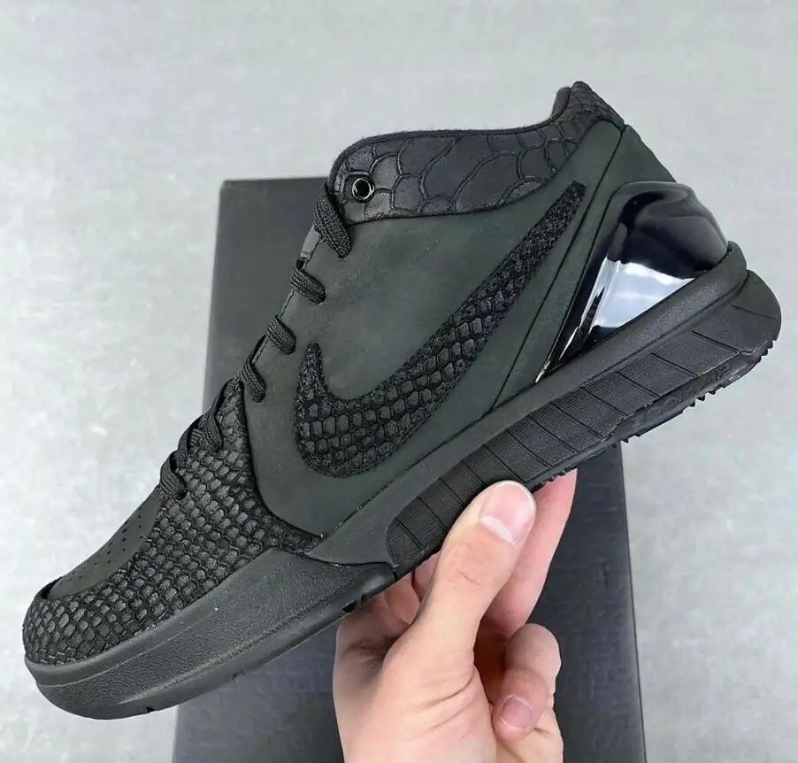Black Nike Kobe 4 Protro sneaker with snakeskin pattern, heel cushioning, fast shipping