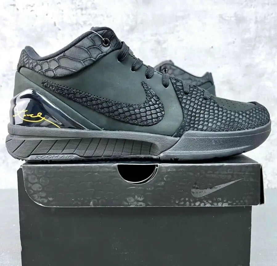 Black Nike Kobe 4 Protro basketball shoe with snakeskin texture and yellow signature detail, fast shipping available