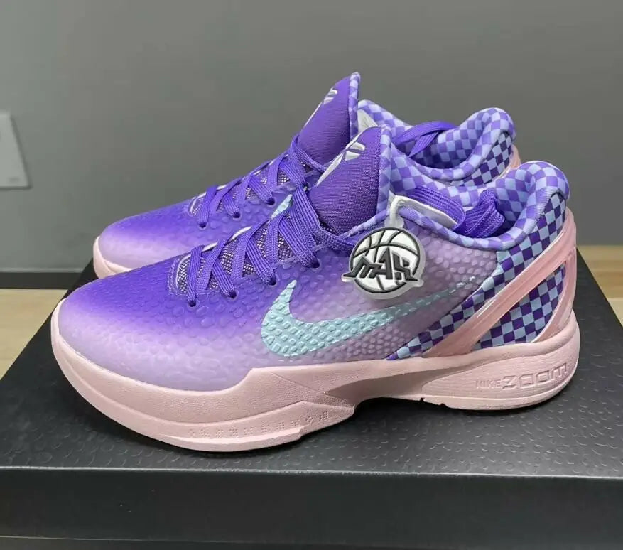 Nike Kobe 6 Purple Checkerboard athletic shoes with purple pink gradient and light blue swooshes