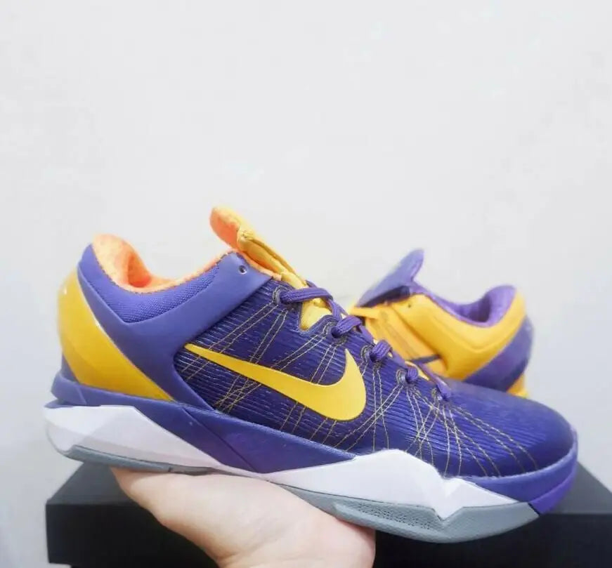 Purple and yellow Nike Kobe 7 Yin Yang basketball shoes with white and gray soles for fast shipping