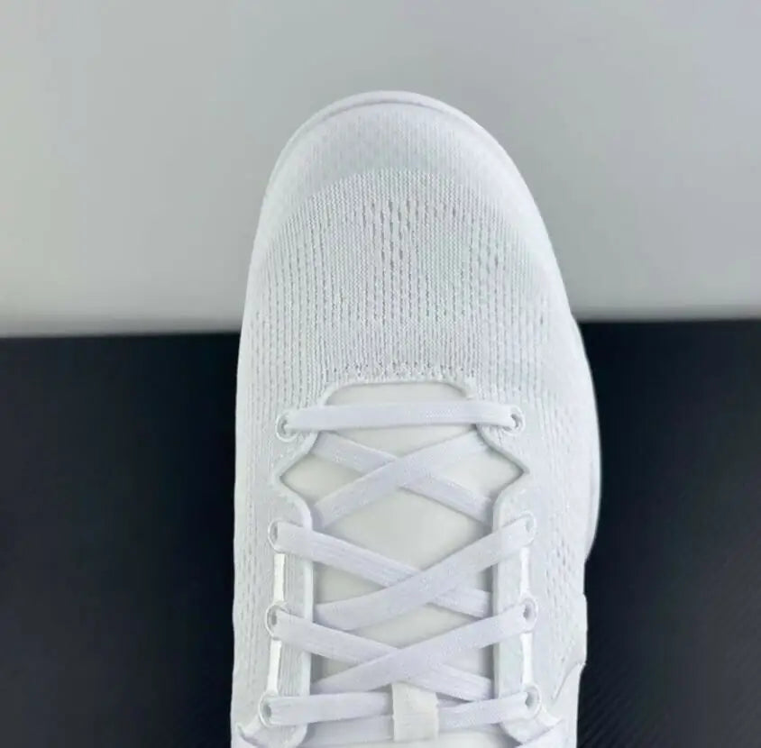 White knit Nike Kobe 8 Protro athletic shoe with crisscross laces, fast shipping available
