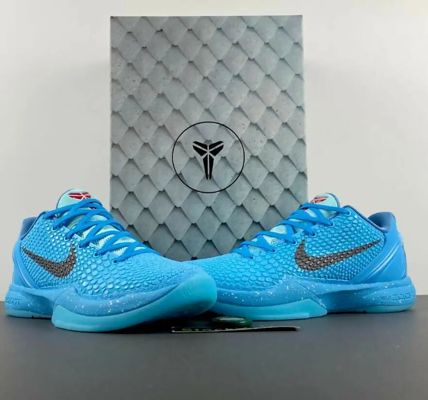 Light blue Nike Kobe Zoom 6 Protro Ice Grinch sneakers with black swoosh and grey Kobe box