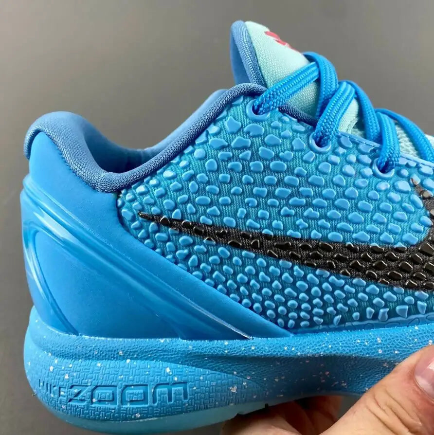 Nike Kobe Zoom 6 Protro Ice Grinch vibrant blue athletic shoe with textured upper