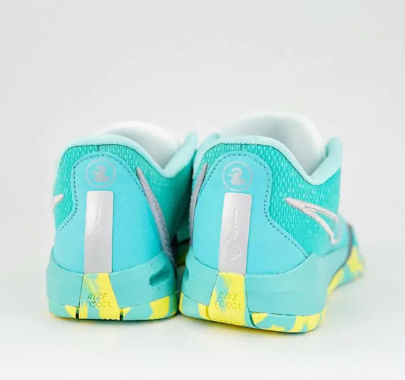 Nike Sabrina 1 Lonescu Ice Blue athletic shoes in turquoise and yellow, fast shipping available
