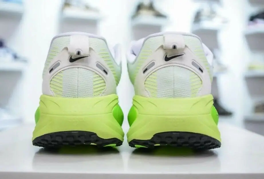 Nike Vomero 18 electric Green Volt running shoes with white, neon green, and black soles