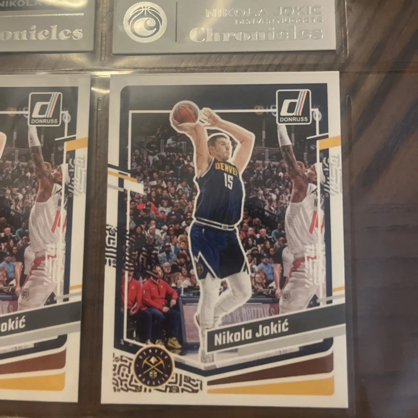 Nikola Jokić basketball card featured in Nikola Jokić 16 Card Lot trading cards