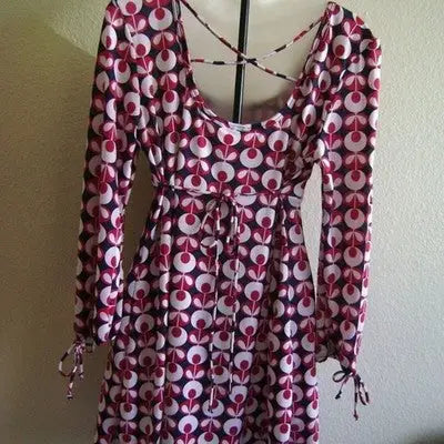 Navy and pink patterned stretch garment with care tags from No Boundaries Juniors Top