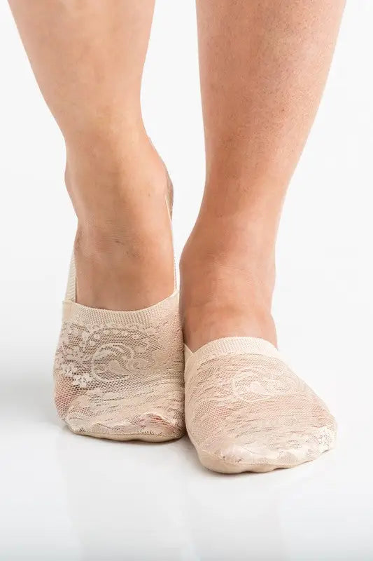 Nude-colored floral lace sneaker socks on feet from the No-Slip Floral Lace Sneaker Socks 3 Pack