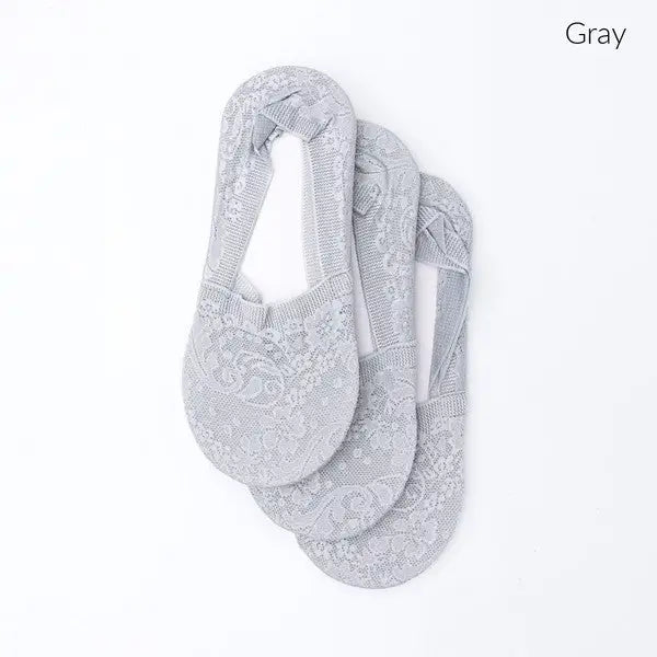 Three pairs of gray floral lace sneaker socks in a 3 pack for comfortable wear