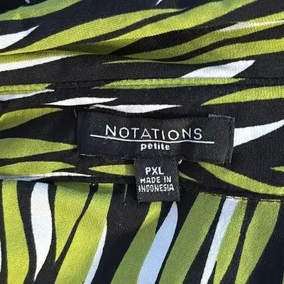 Black, white, and lime green patterned women’s blouse from Notations Petite collection