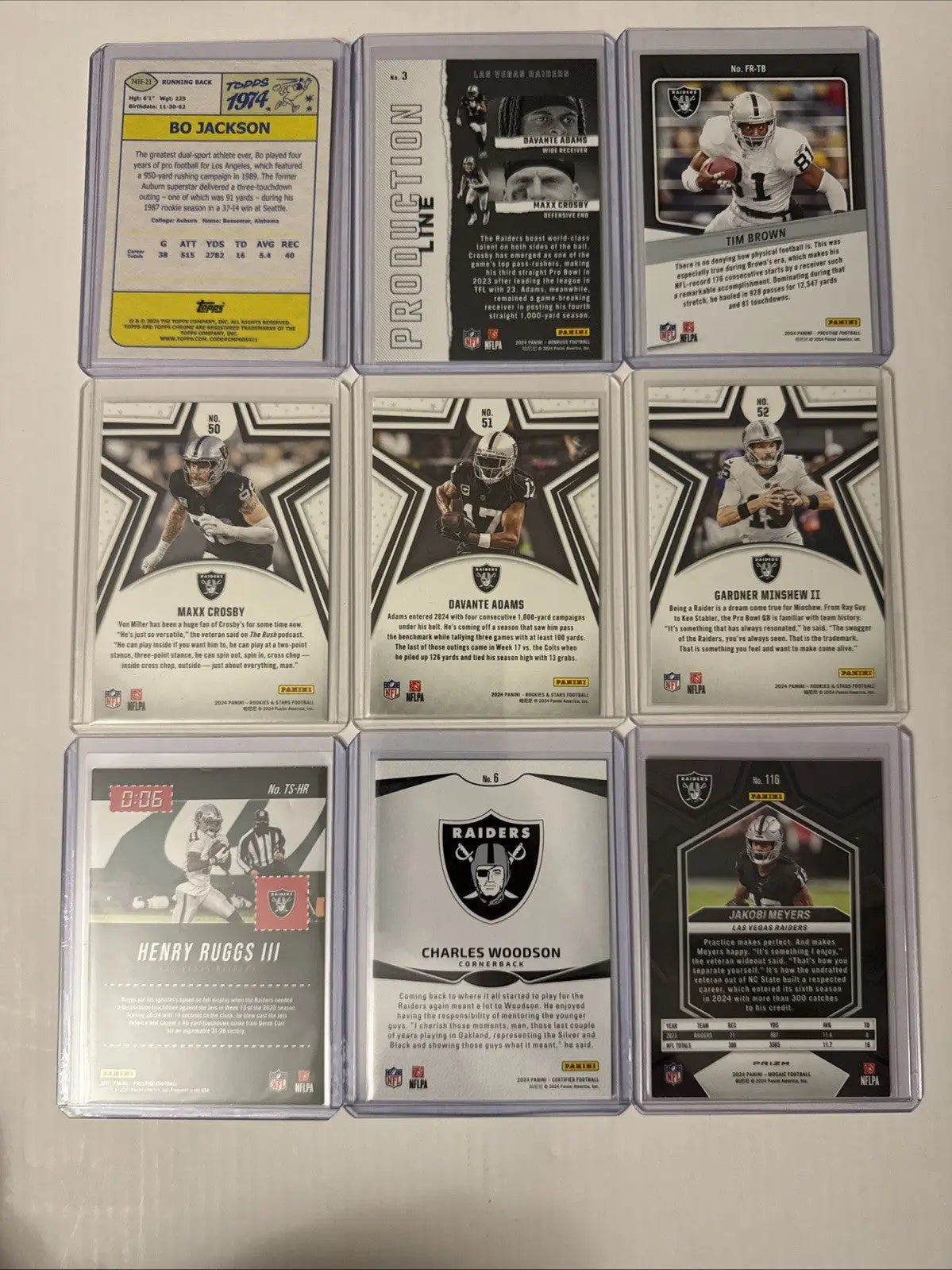 Oakland Las Vegas Raiders trading cards collection in protective sleeves for fans and collectors