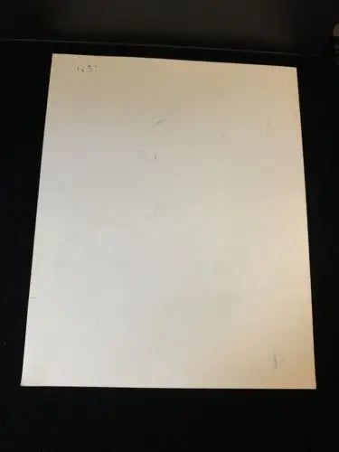 Blank white rectangular paper for Houston Oilers Zeke Moore trading cards display
