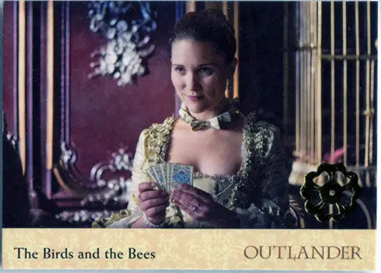 Woman in ornate period costume with playing cards from Gold Jacobite Seal Parallel Variant