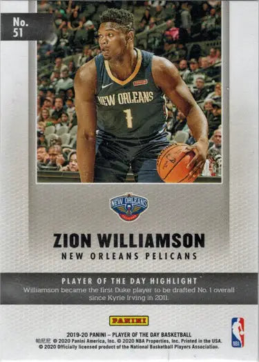 Basketball trading card of Zion Williamson in navy Pelicans jersey dribbling ball as base rookie card