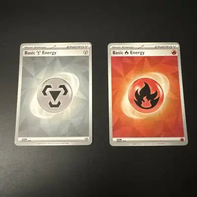 Pokemon Surging Sparks lot of 12 cards featuring Metal and Fire Basic Energy cards