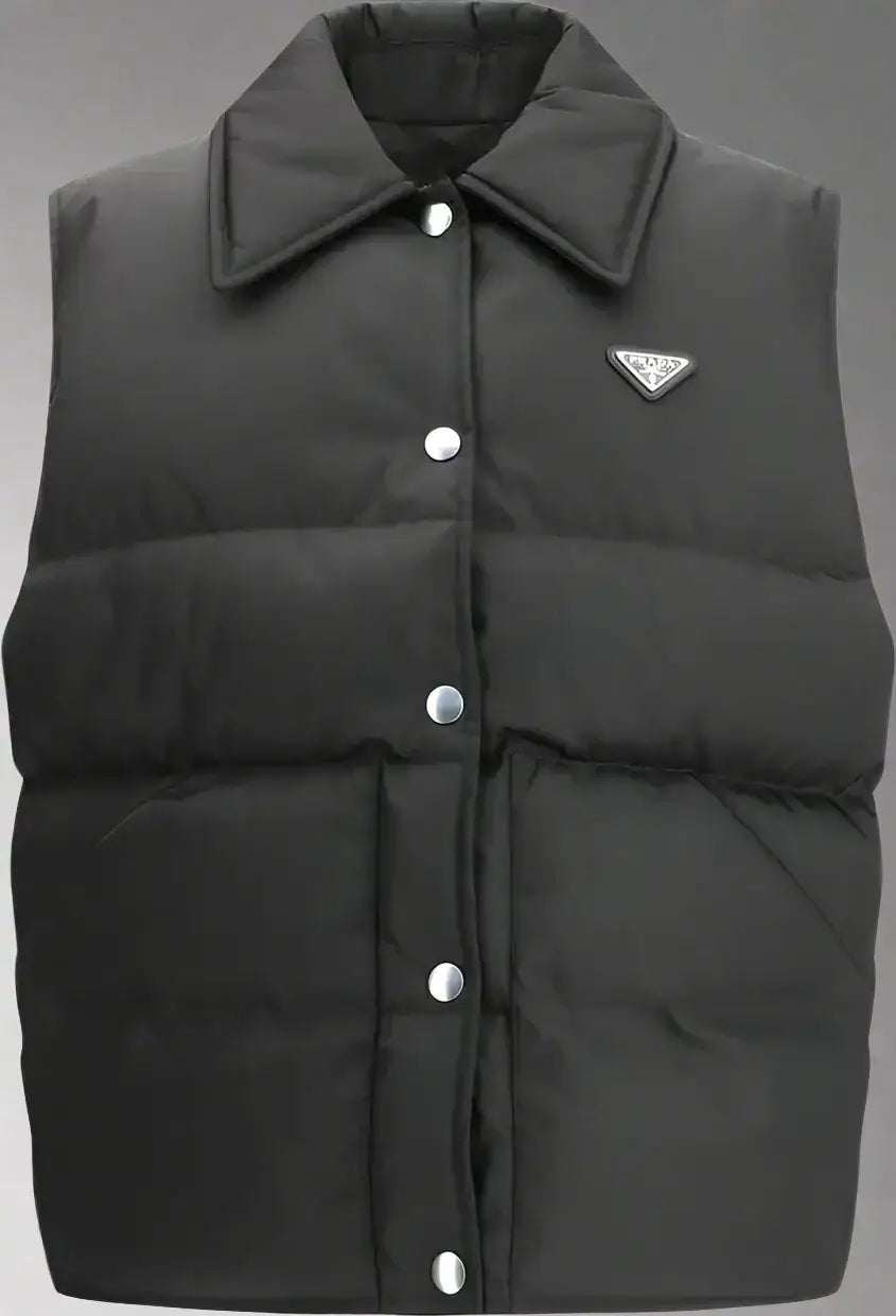 Black sleeveless puffer vest with pointed collar and silver snap buttons for PRADA women