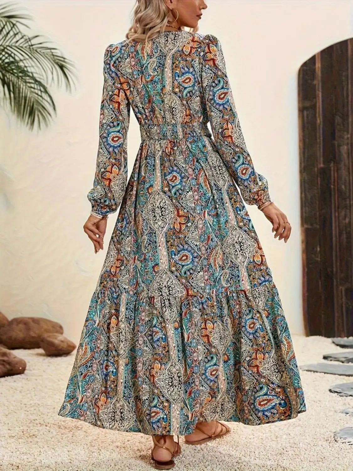 Women’s long-sleeve paisley print maxi dress with shirred waist and tiered hem